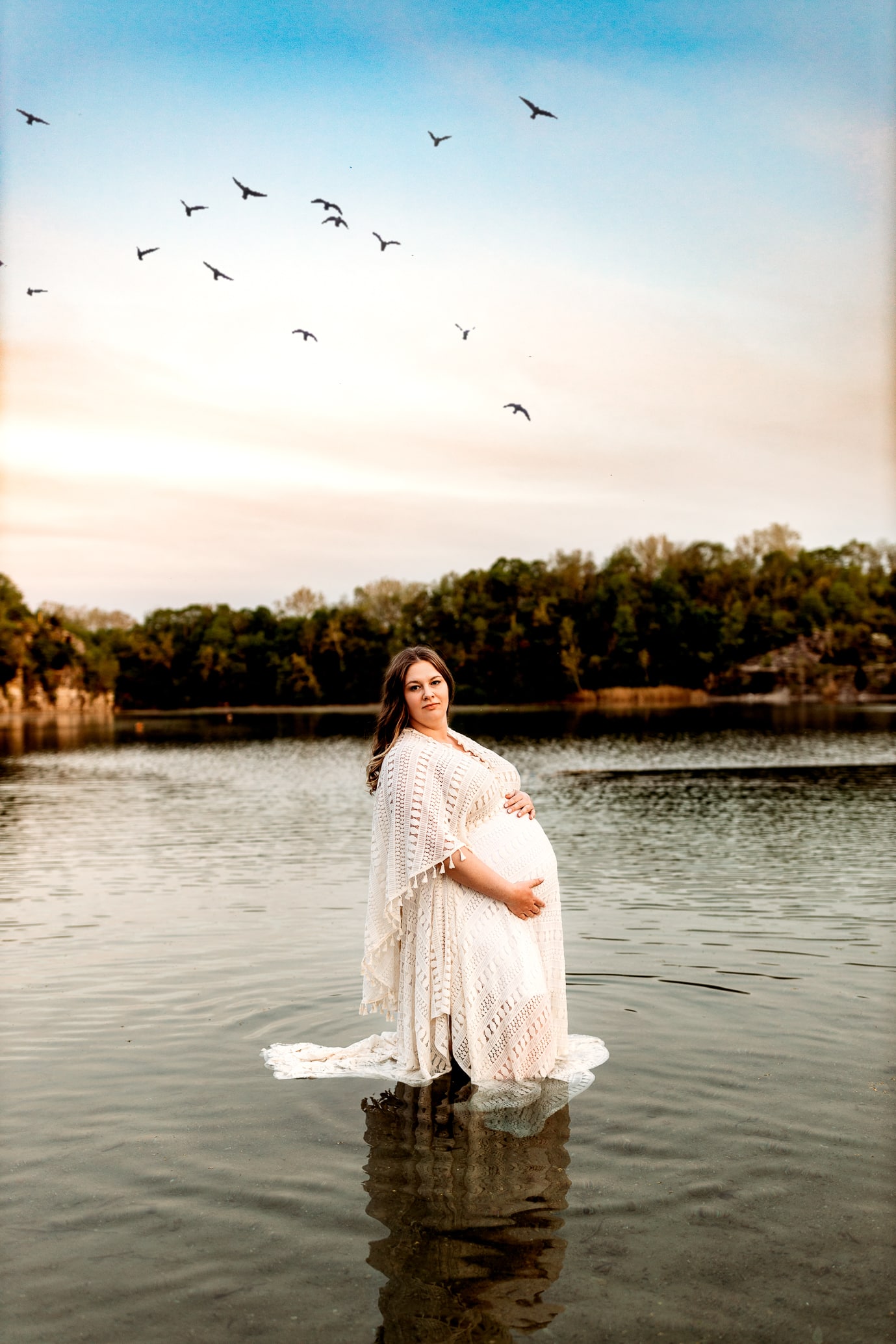 Pregnant mother posed in water