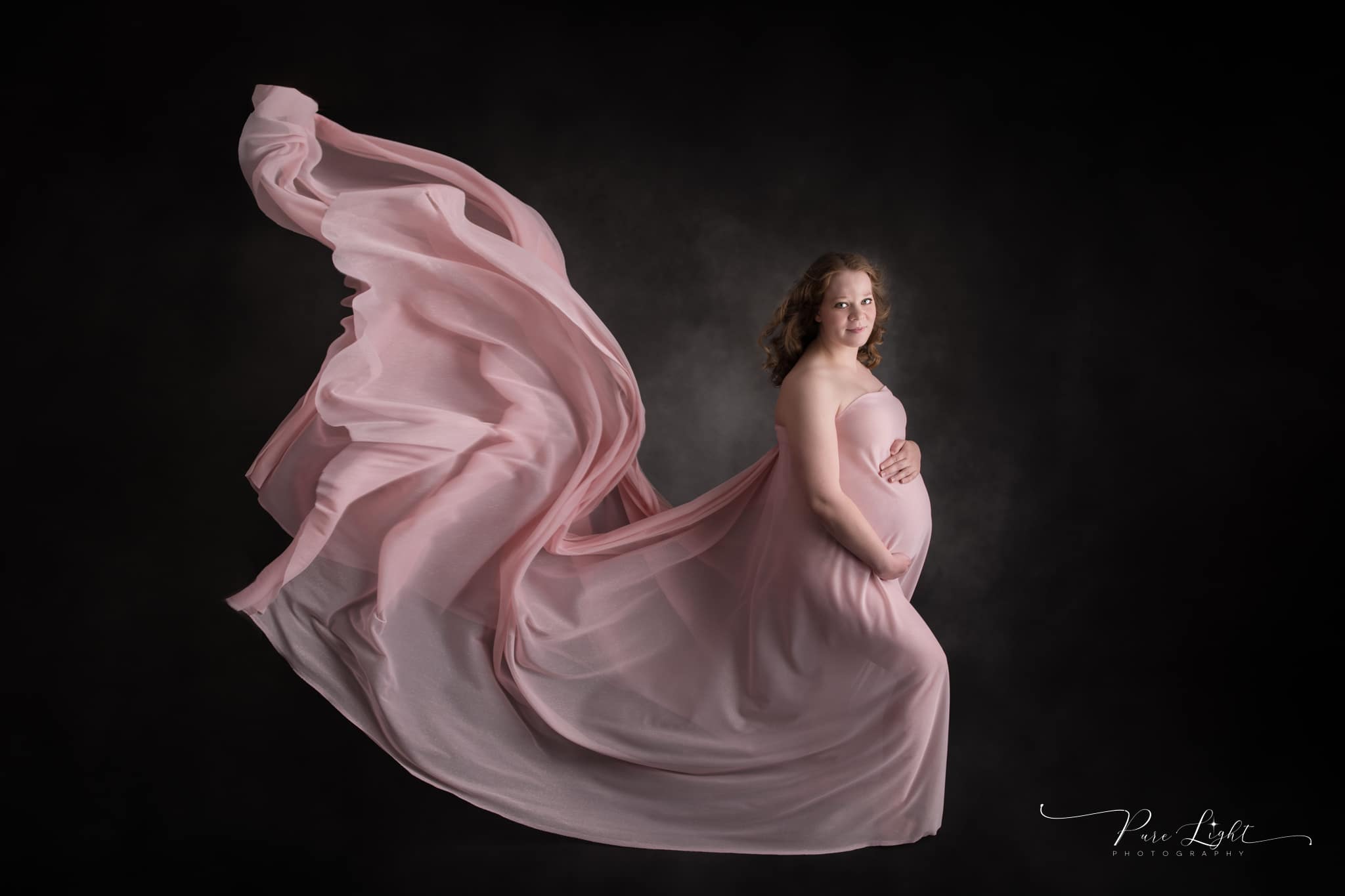 Maternity portraits with flowy gown